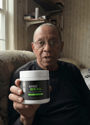 Raymond holding a bottle of mindrecall