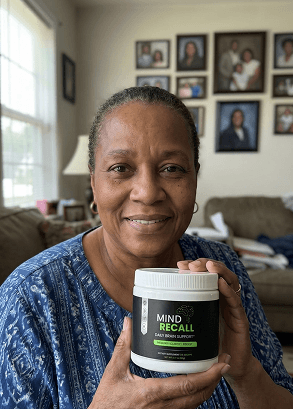 Yvonne holding a bottle of mindrecall